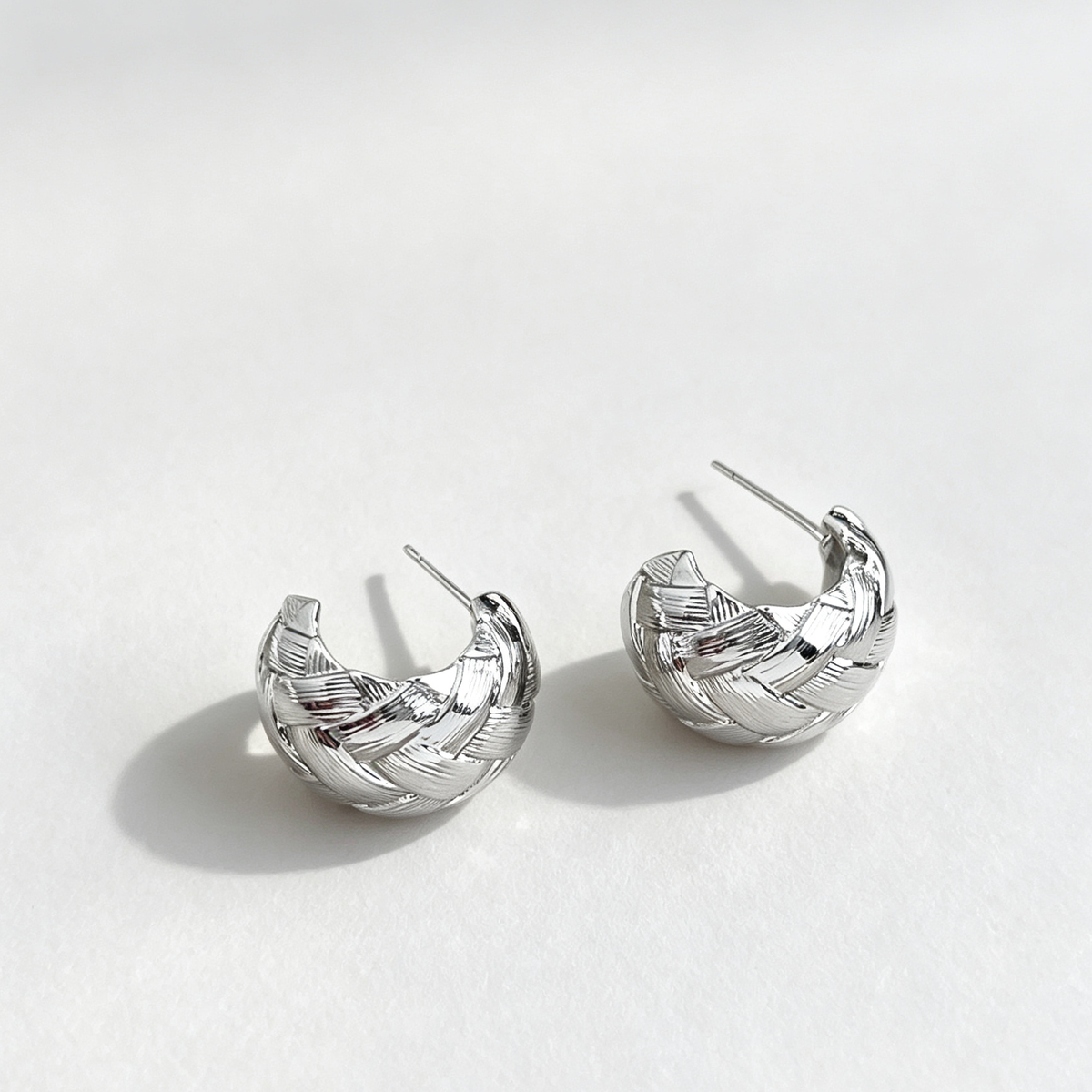 The Woven Silver Studs
