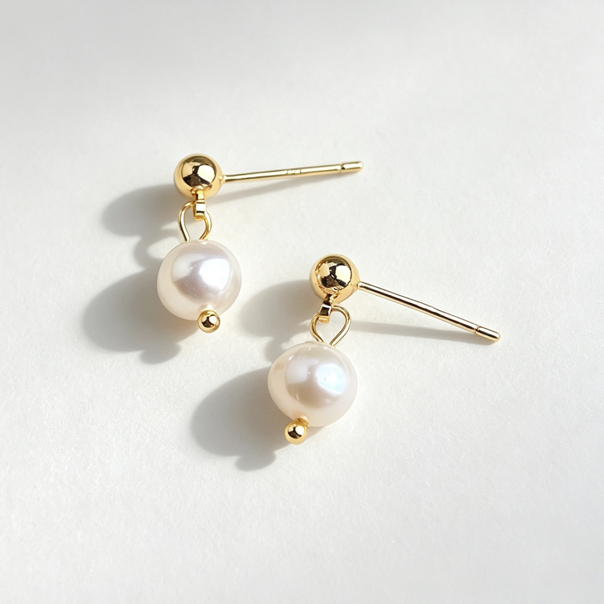 The Petite Pearl Drop Studs