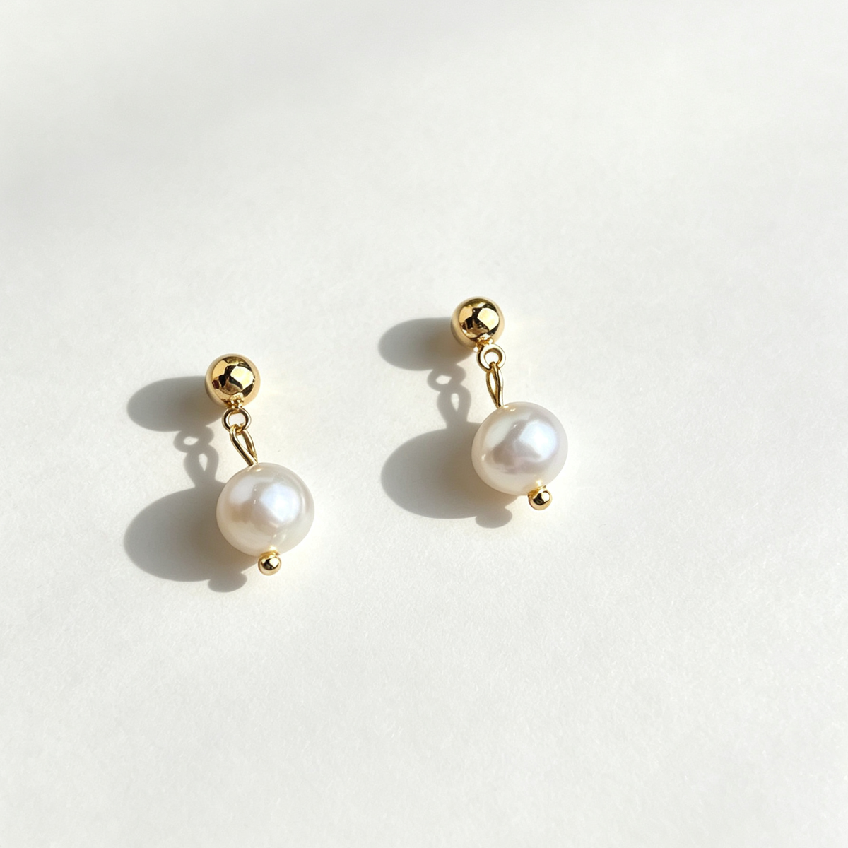 The Petite Pearl Drop Studs