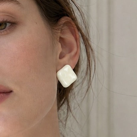 The Ivory Enamel Studs